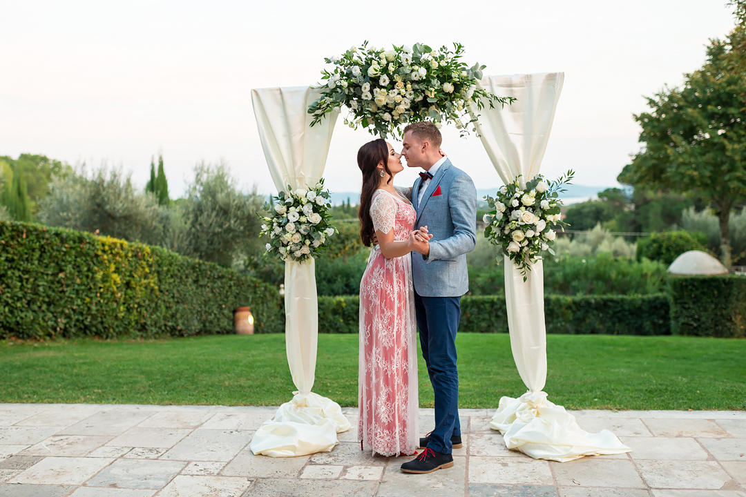 flower arch wedding tuscany